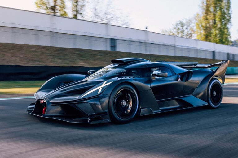 black Bugatti Bolide on road