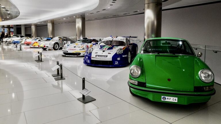 Various Porsche 911's next to one another display