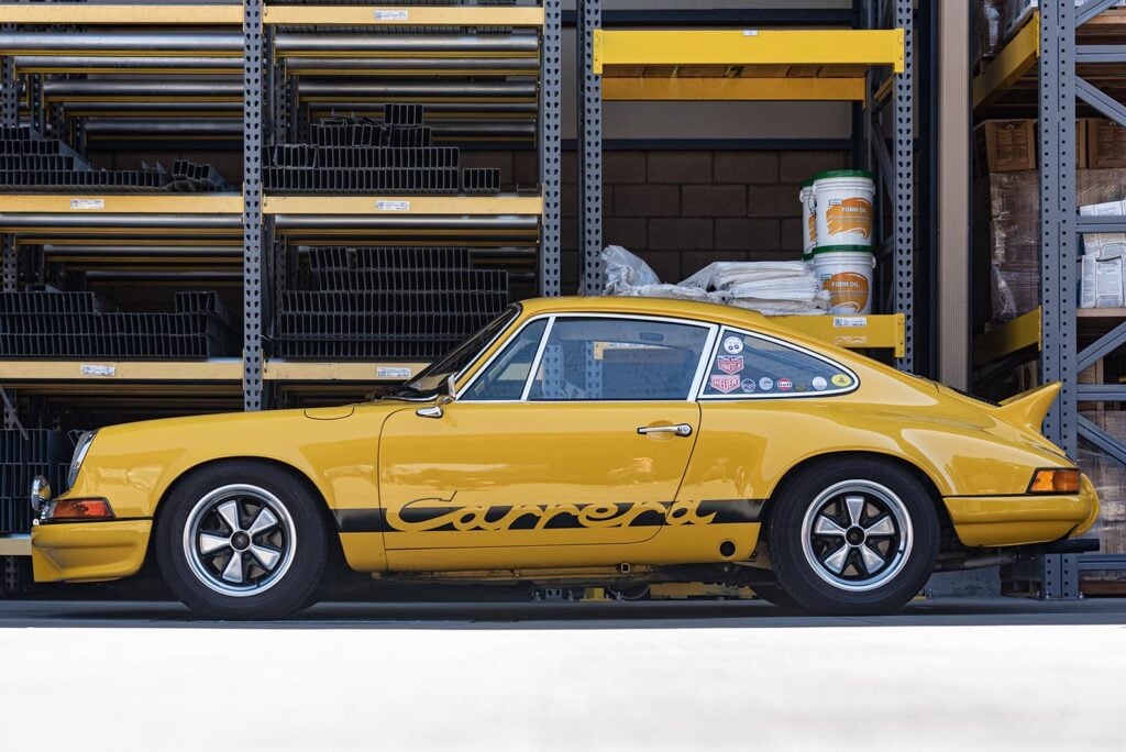 Yellow Porsche 911 Carrera side profile