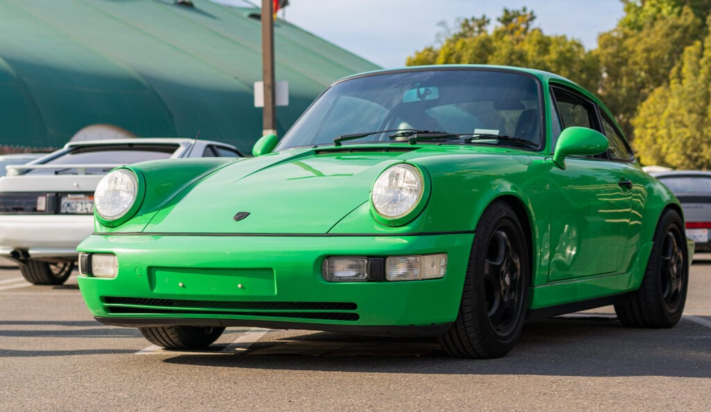 Green 911 on road