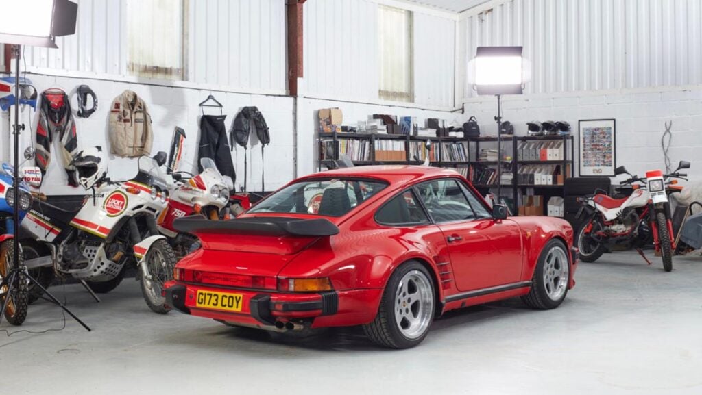 3/4 rear shot red Porsche 930 in garage 