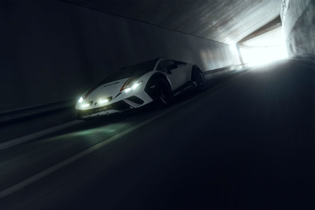 A Lamborghini Huracán Sterrato driving through a tunnel