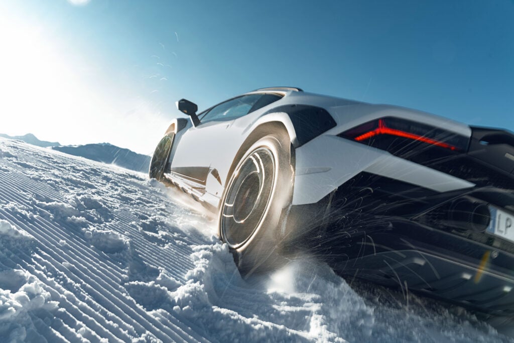 Lamborghini Huracán Sterrato drifting in snow bank