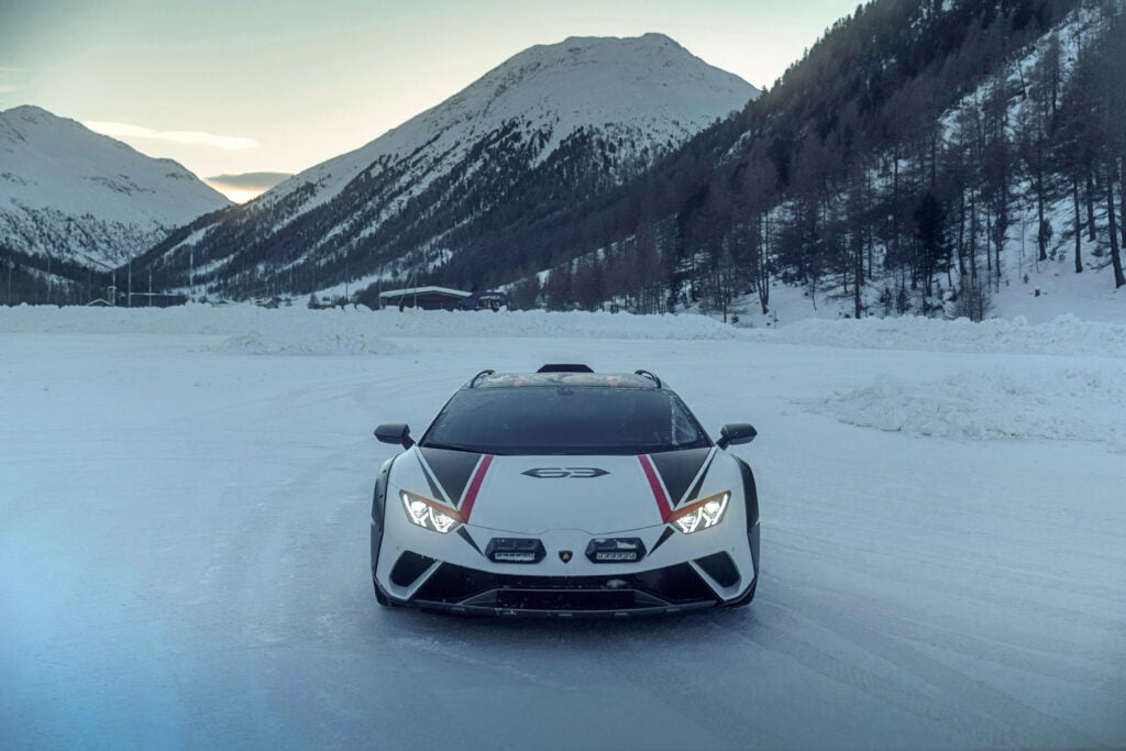 white Lamborghini Huracán Sterrato at a ski resort in Italian Alps