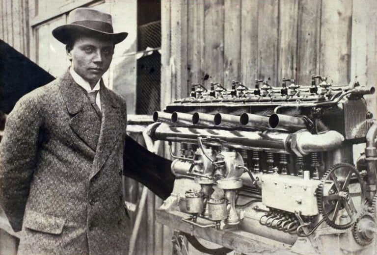 black and white photo of a young Gustav Otto next to engine