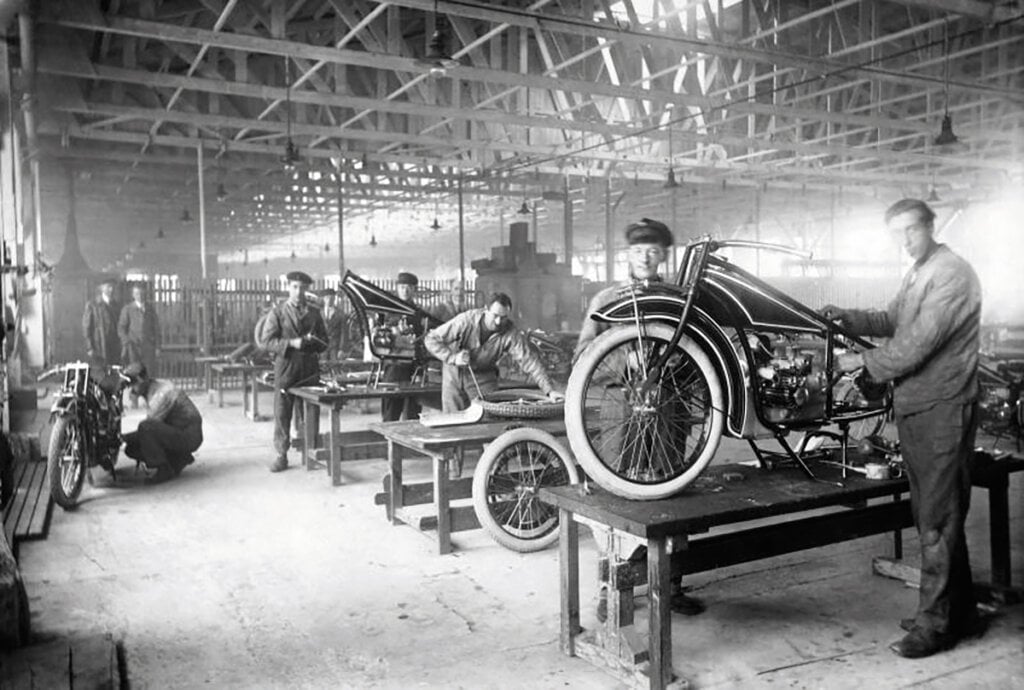 men on an assembly line for bmw