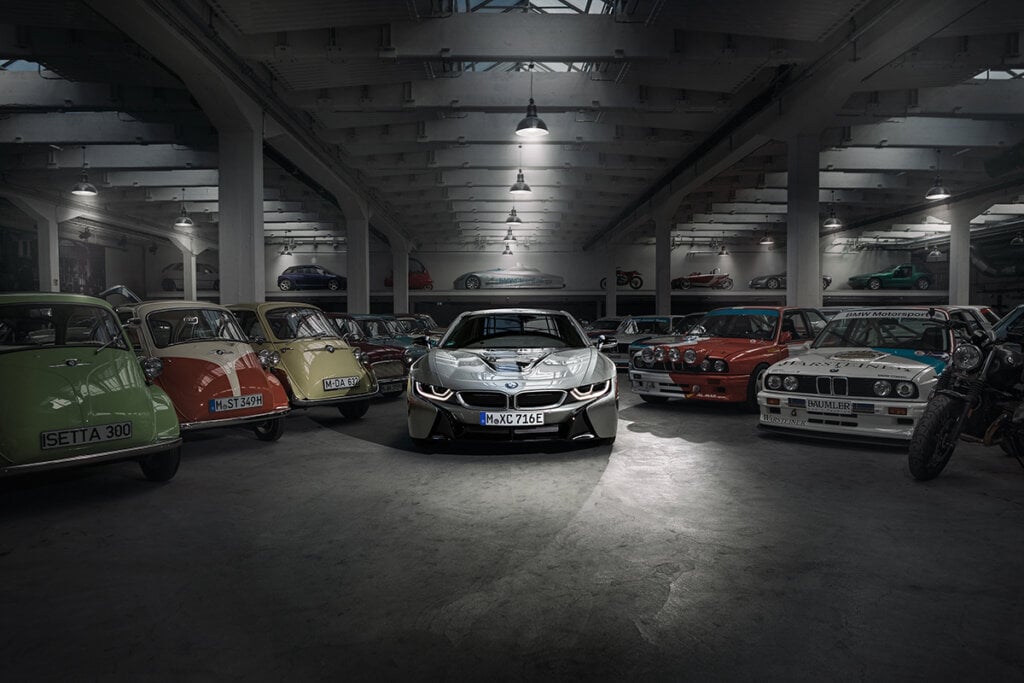 Silver BMW i8 in front of other BMW cars