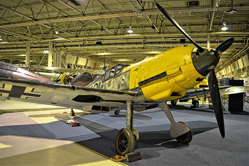 yellow Bf 109 fighter plane in museum