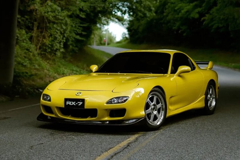 Yellow Mazda Rx7 FD on road