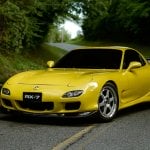 Yellow Mazda Rx7 FD on road