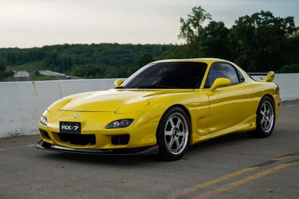Yellow Mazda RX7 FD parked 