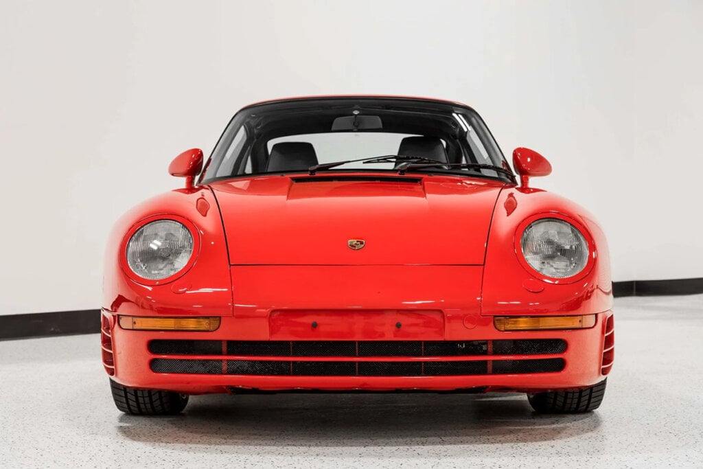 Red Porsche 959 in showroom