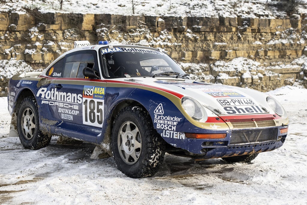 blue Porsche 959 on snow