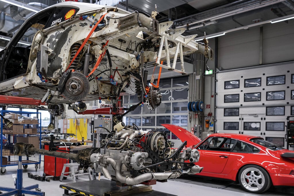 Porsche 959 deconstructed in garage