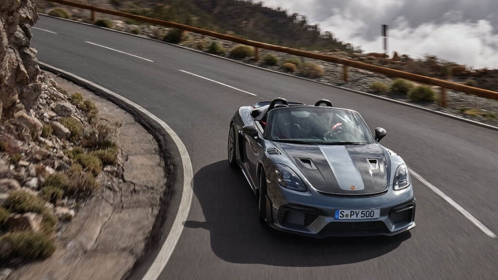 Porsche Spyder RS driving through mountains