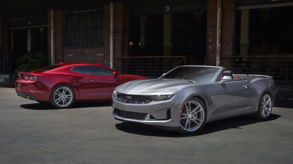red 2023 chevy camaro coupe and gray 2023 chevy camaro convertible 