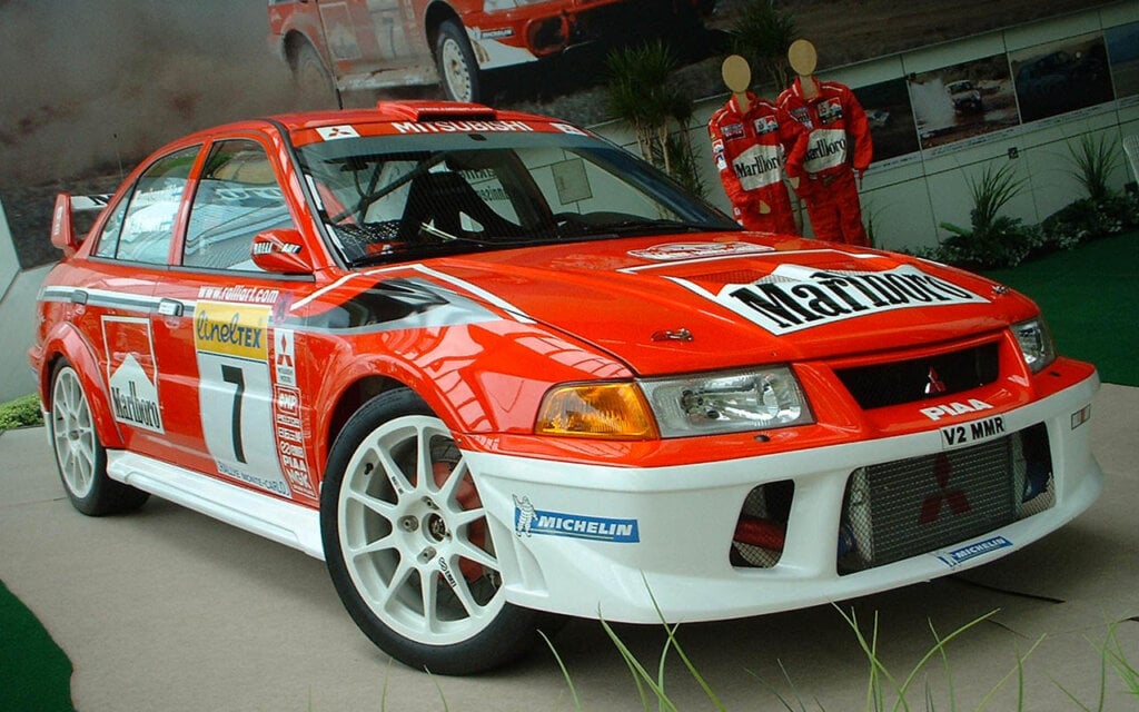 red/white Tommi Mäkinen edition mitsubishi rally car