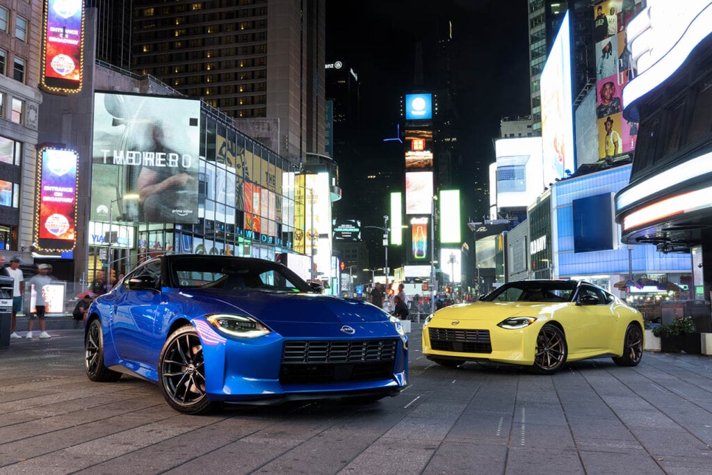 2023 Nissan Z cars in a busy city street