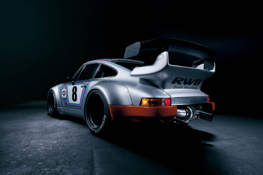 rear wing of a RWB porsche with martini livery