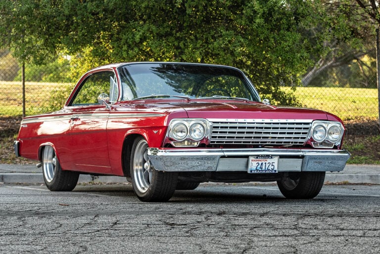 red impala bubbletop at a park