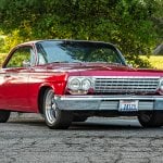 red impala bubbletop at a park