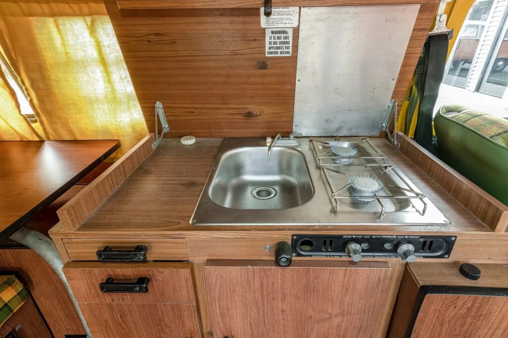 wood and steel Kitchen of a 1977 Westfalia VW
