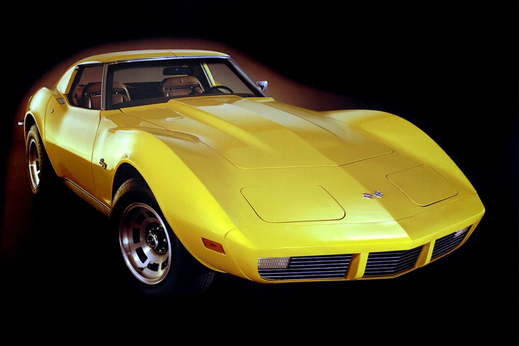 Yellow C3 Corvette on black background