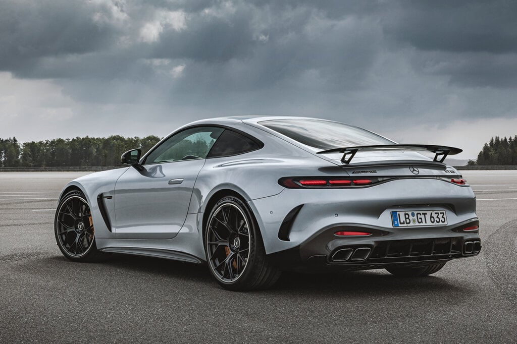 rear end of the new AMG GT Coupe, dark cloudy background behind it