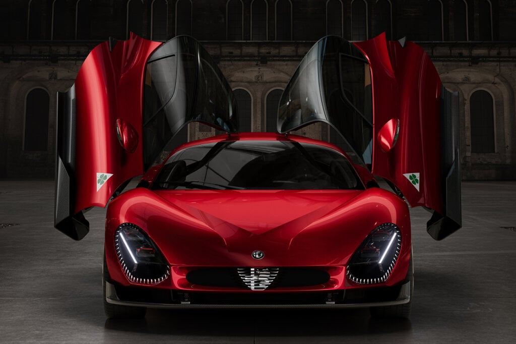 Butterfly doors opened up on a red 33 Stradale