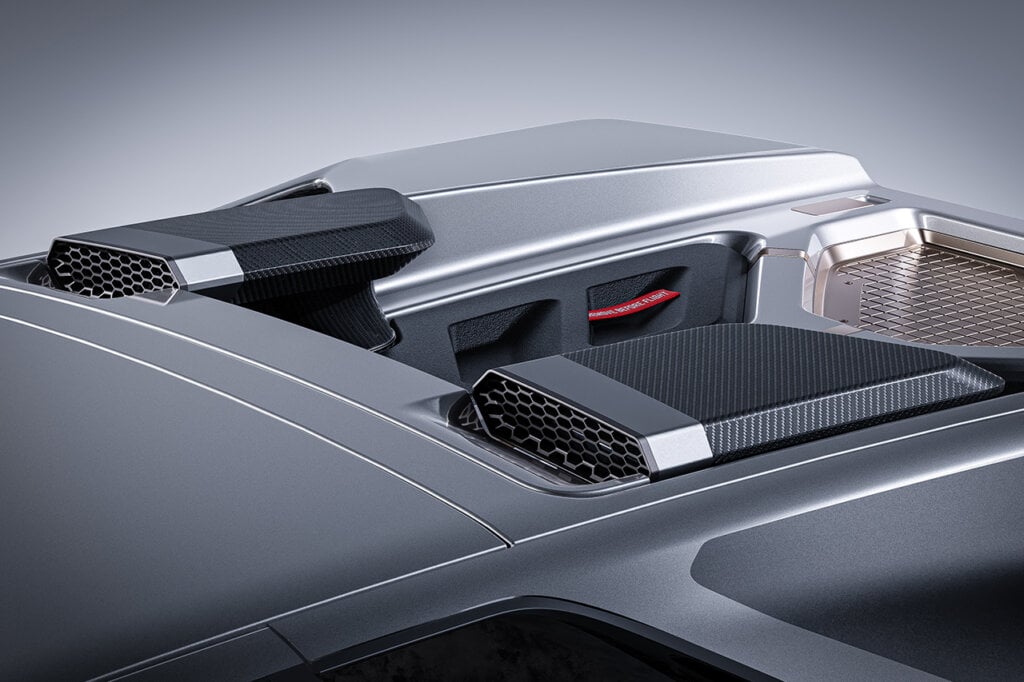 Silver Lamborghini with upgraded carbon fiber vents, grey background