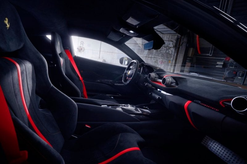 Bespoke interior of the Novitec 812, black and red alcantara suede finish on seats and dash