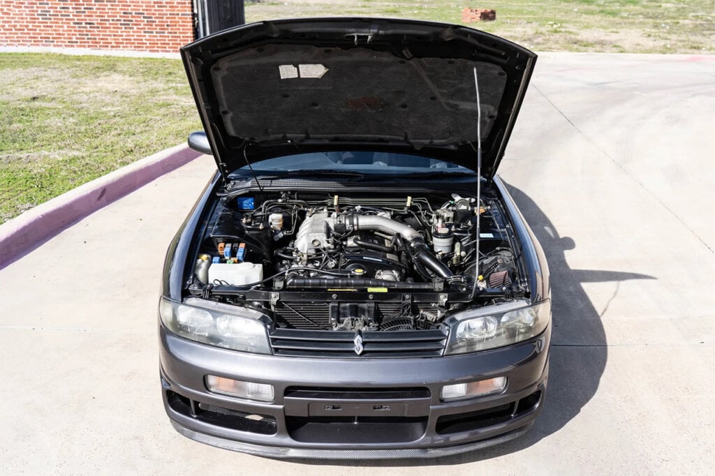 1993 Nissan Skyline R33 GTST with hood open showing engine