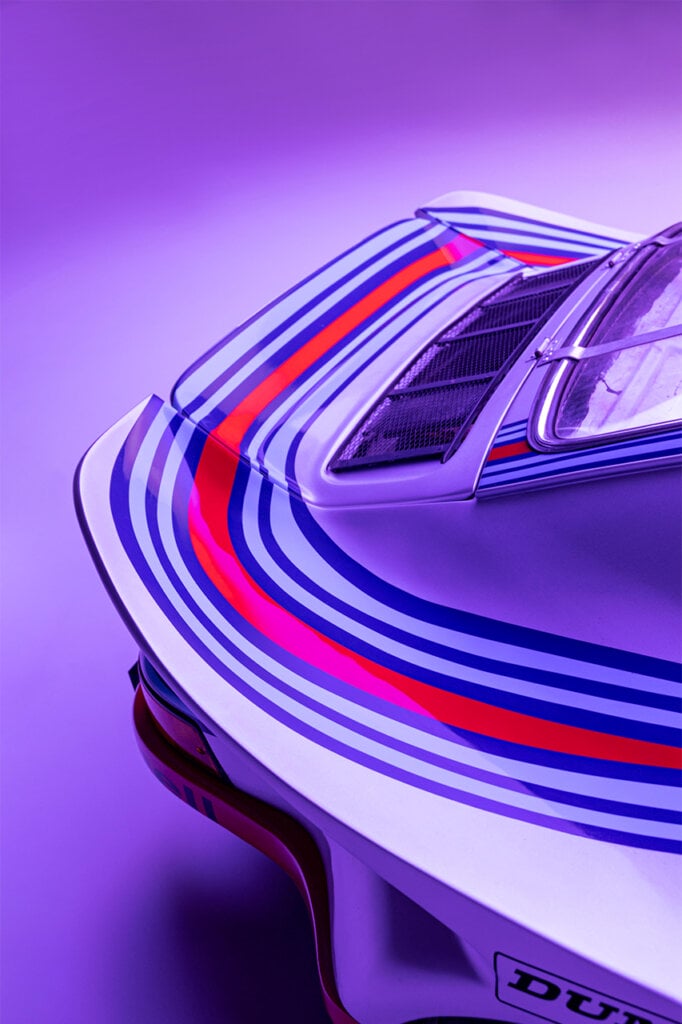 Martini Race Livery red and blue stripes on the rear wing. purple hue covering photo