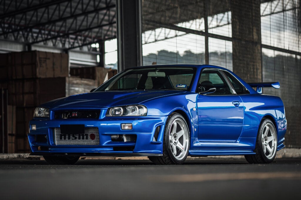bayside blue R34 in steel structure, railings and columns behind it