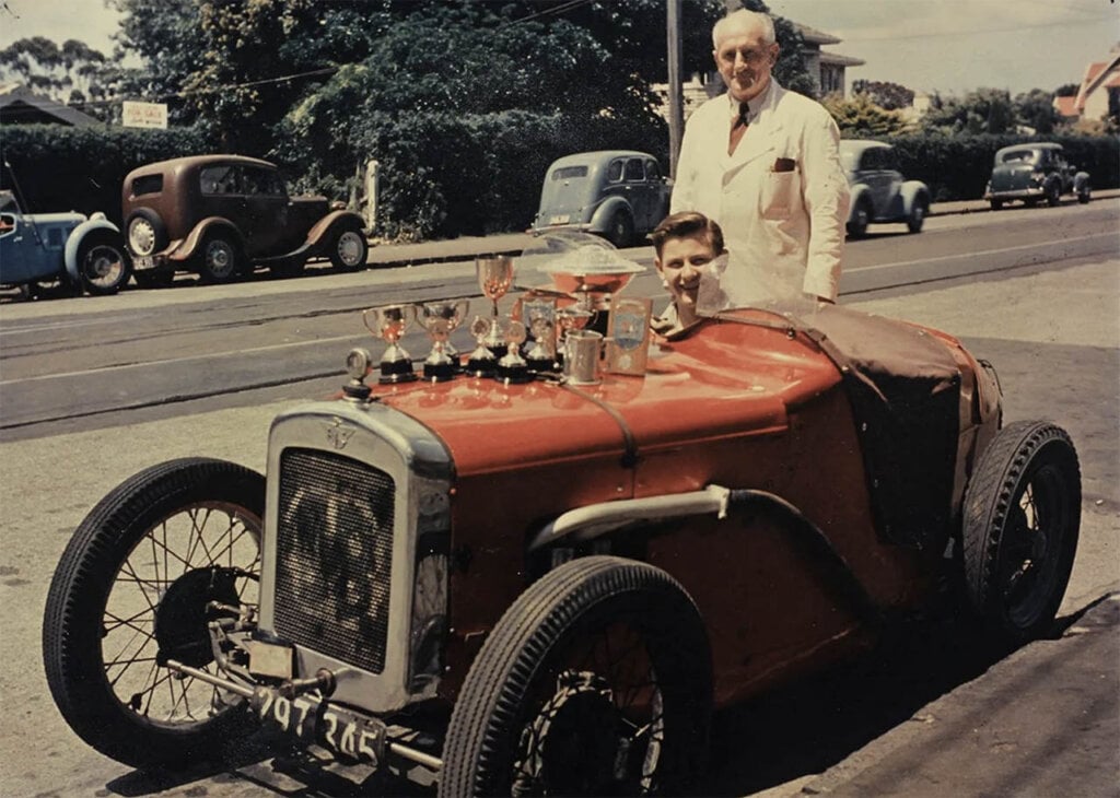bruce mclaren and his father next to an Austin 7 Ulster
