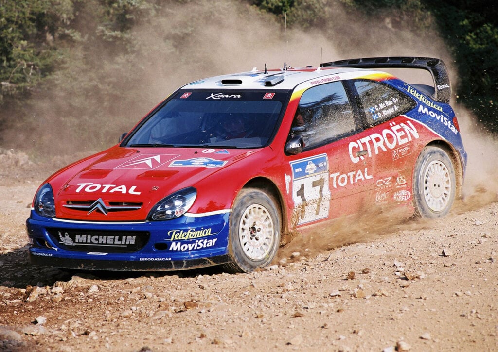 red and blue Citroën Xsara WRC at the 2003 Rally Acropolis