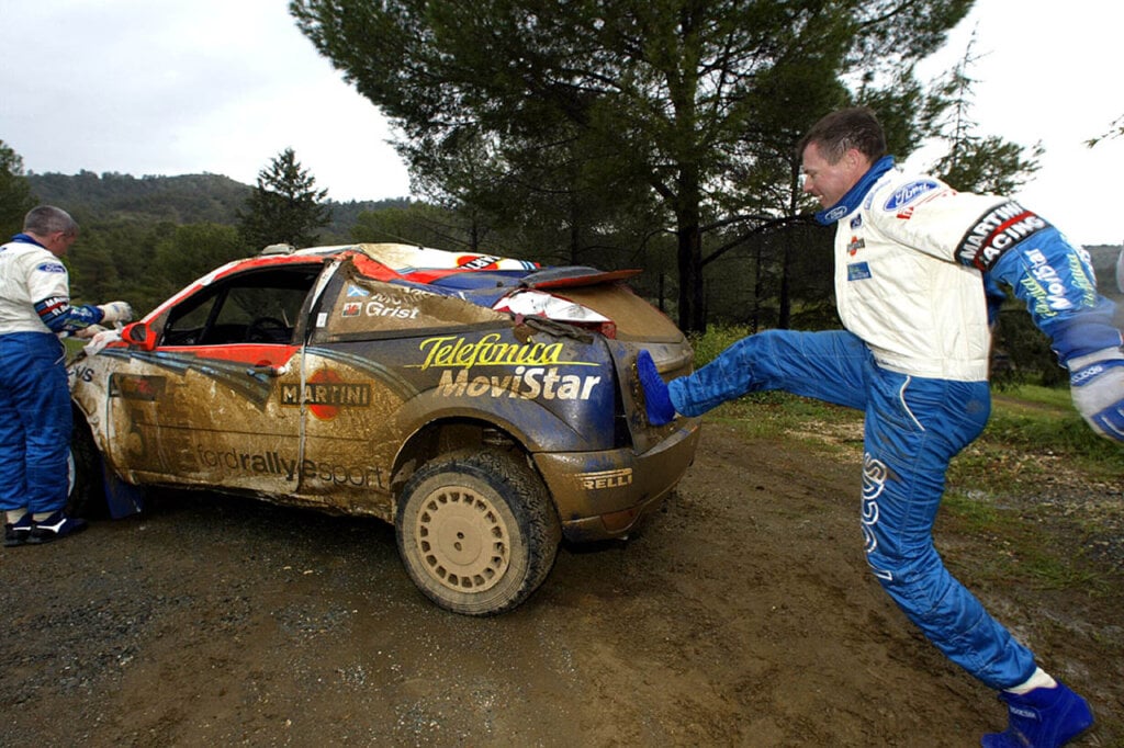 colin mcrae kicing a ford focus with martini livery