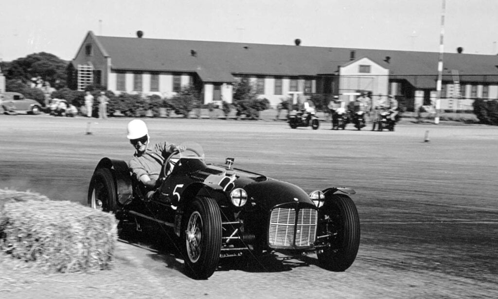 ken miles driving his first r-1 MG special at long beach