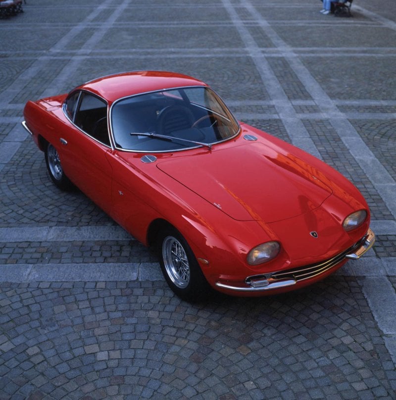 red 250 gt on pavement