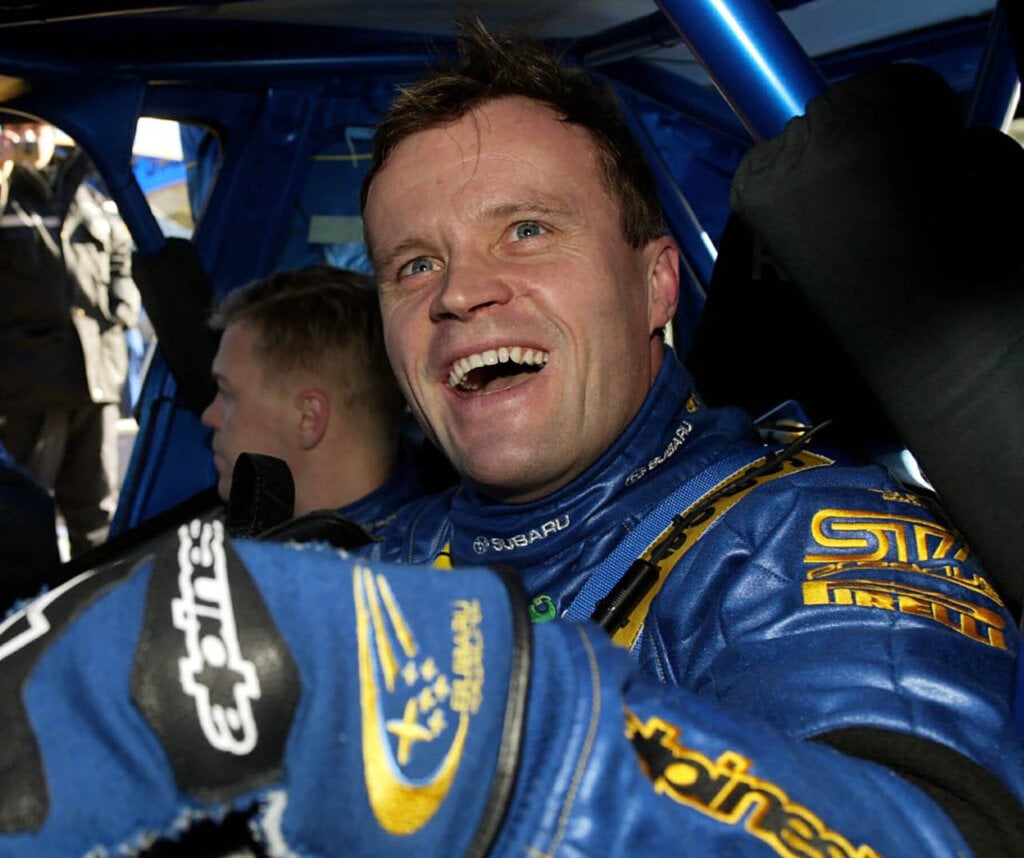 Tommi Mäkinen in a subaru rally car