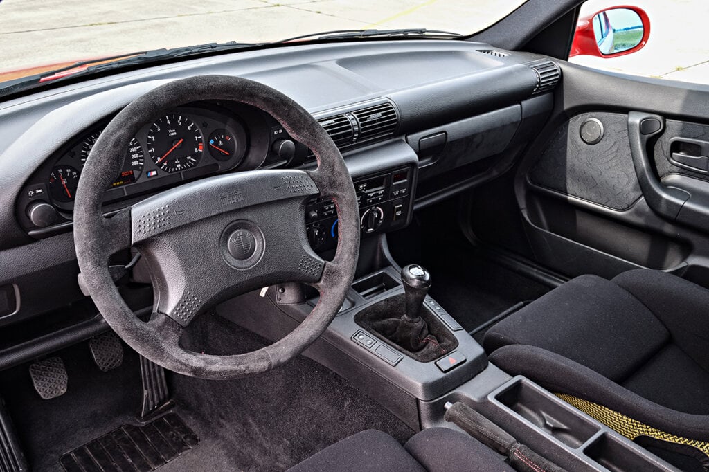 BMW e36 m3 alcantara suede interior. With a manual stick shift in the center console