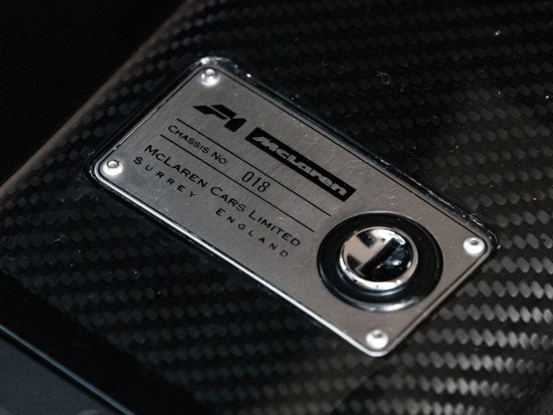 McLaren F1 Badge on a carbon fiber panel