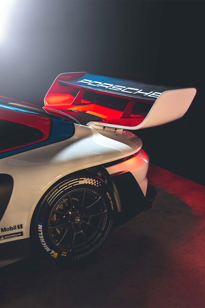 Detail shot of the rear GT wing setup on the Porsche 911 GT3 R Rennsport