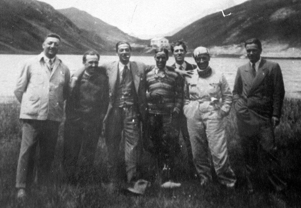 Drivers Enzo Ferrari (1st from left), Tazio Nuvolari (4th) and Achille Varzi (6th) of Alfa Romeo with Alfa Romeo Managing Director Prospero Gianferrari (3rd) at Colle della Maddalena, c. 1933