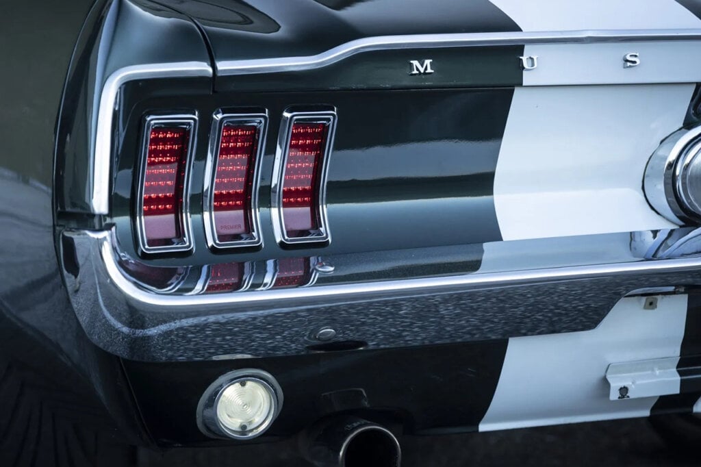 Ford Mustang Fastback taillight with white racing stripe closeup
