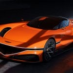 Orange Genesis X Gran Berlinetta Concept in a grey showroom