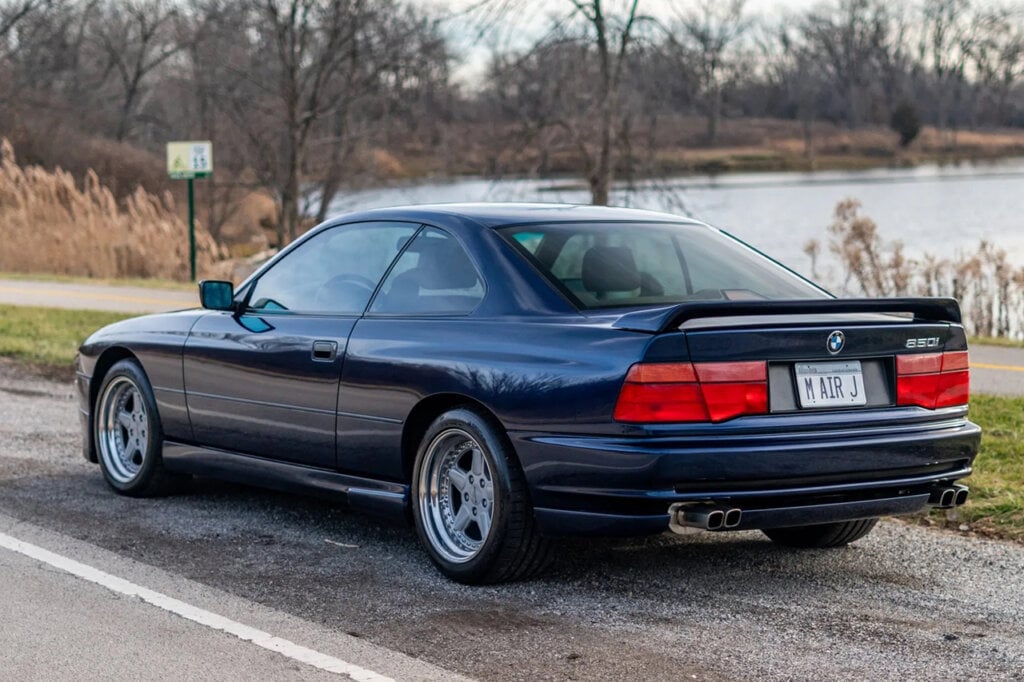 3/4 rear shot of Michael Jordan's Blue E31 for auction on side of the road