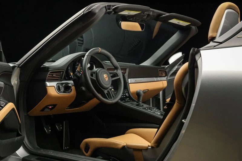 interior shot of the 911 speedster with black and brown leather accents