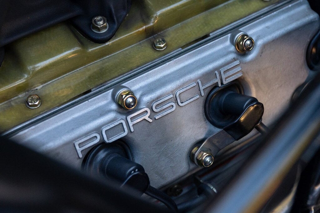 Porsche stamped logo on side of motor