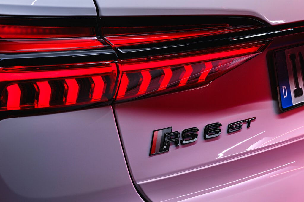 Rear taillight and RS6 GT badge closeup on white Audi